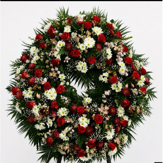 CORONA FUNEBRE PREMIUM TONOS ROJOS Y FLOR BLANCA
